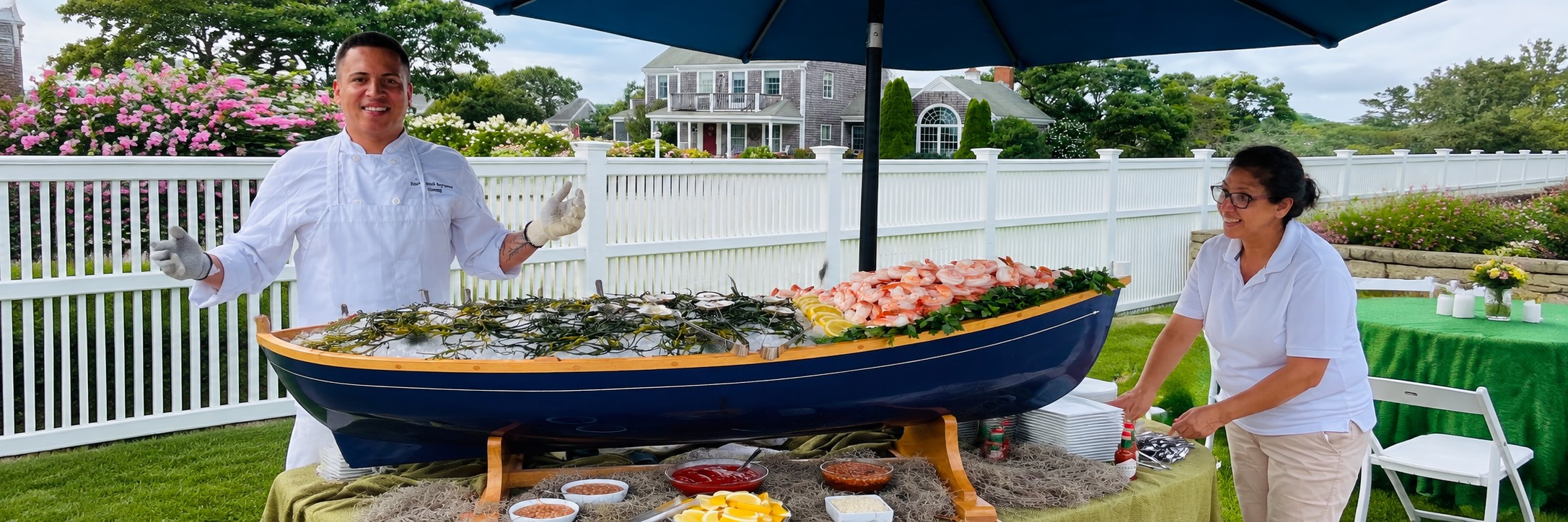 Raw bar catering in Boston with oysters, clams and shrimp cocktail