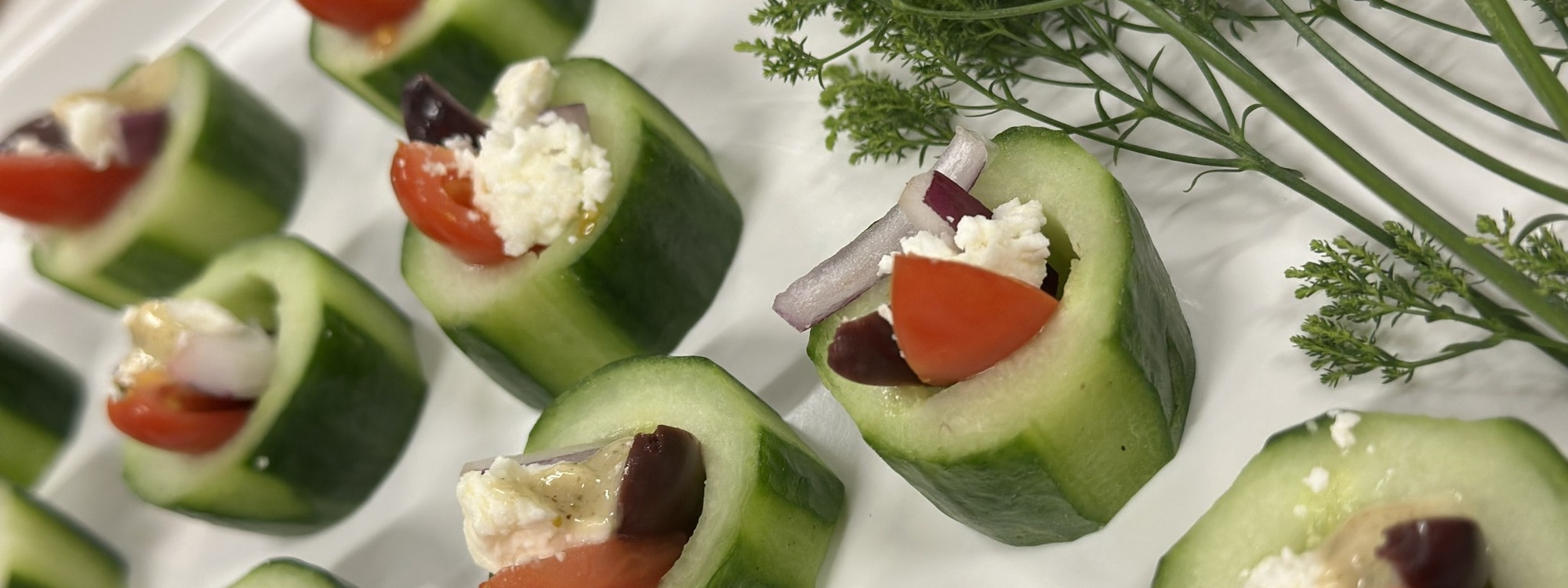 Summer wedding catering with fresh cucumber appetizers