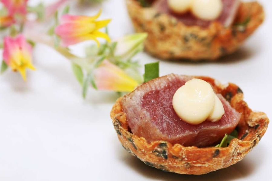 Seared tuna on a sesame tartlet with wasabi aioli